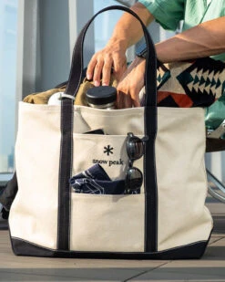 Snow Peak Canvas Noasobi Tote Large 16 Snow Peak Canvas Noasobi Tote Large -Outdoor Camping Sale canvas tote L ec ac 20su003 lifestyle 04